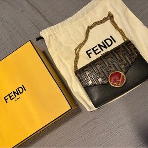 Fendi Black and Gold Clutch with Red Accent
